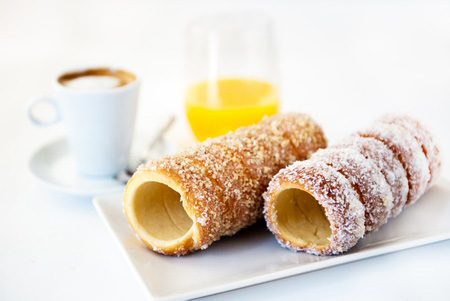 Hungarian buns with coffee and juice